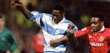 Dennis Bailey in action for QPR against Man United