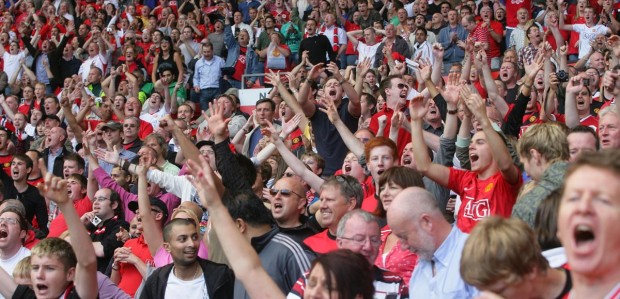 Manchester United fans celebrate inside Old Trafford